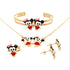 This delightful Little Baby Girl Mouse Jewelry Set, crafted in 10k gold-filled materials, features charming cartoon mouse designs. The set includes a necklace for girls, accompanied by matching bangle, ring, and earrings. Each piece is lead and nickel-free and showcases a mouse adorned with black ears, a pink bow, and a vibrant red outfit.